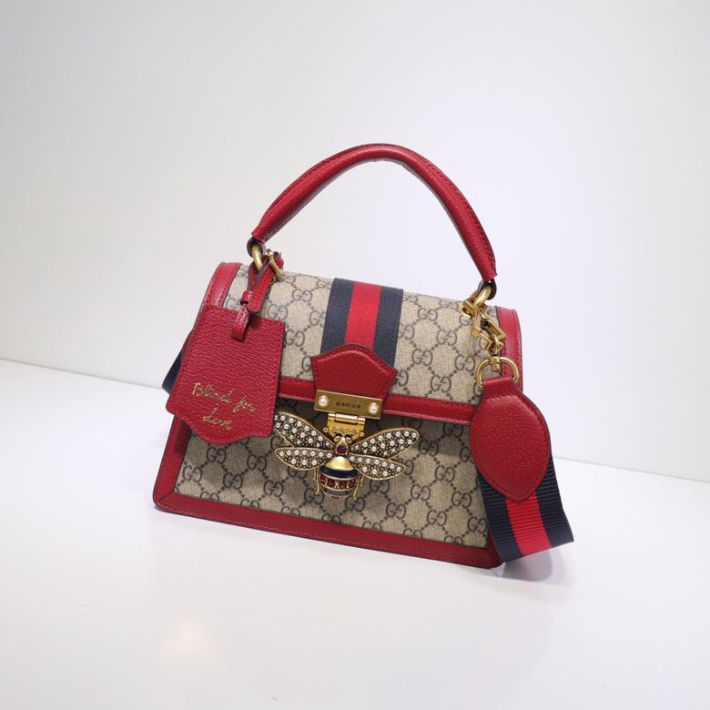 G*u*i top handle bags